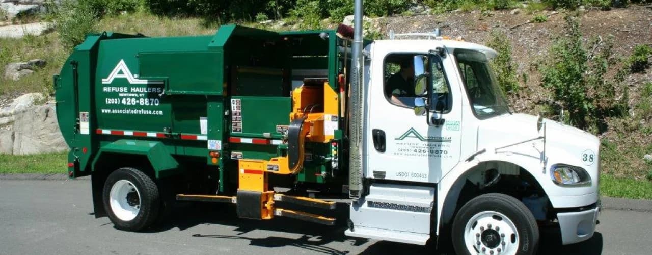 Associated Refuse Haulers delivery truck on a Connecticut residential street