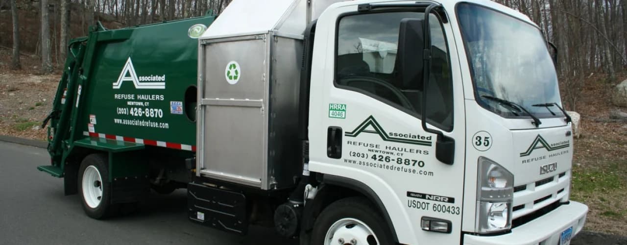 Roll-off container delivered the morning of a roof tear-off